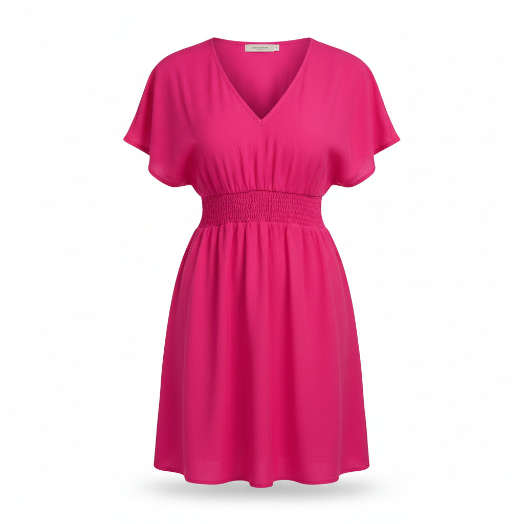 Woman wearing a bright pink dress on a white background