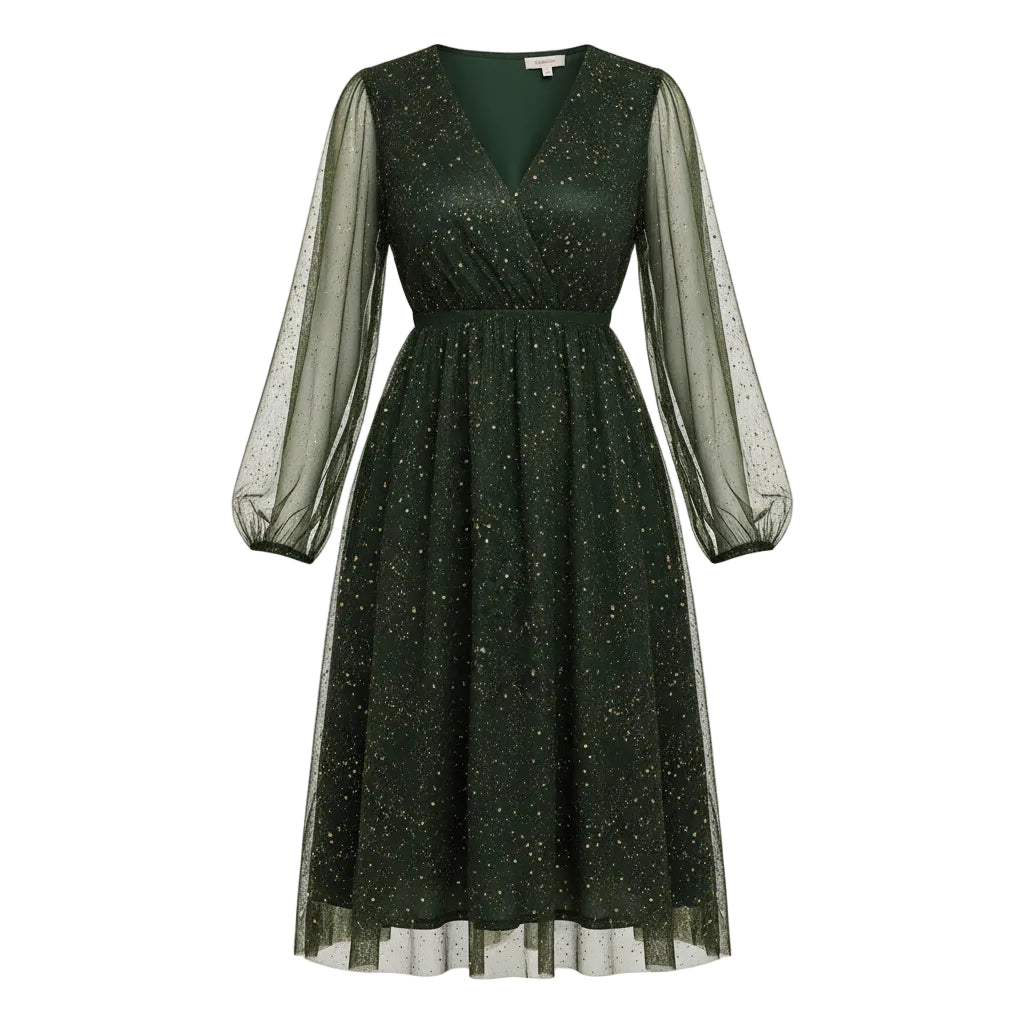 Woman wearing a green sparkly dress in a festive indoor setting with a decorated Christmas tree.